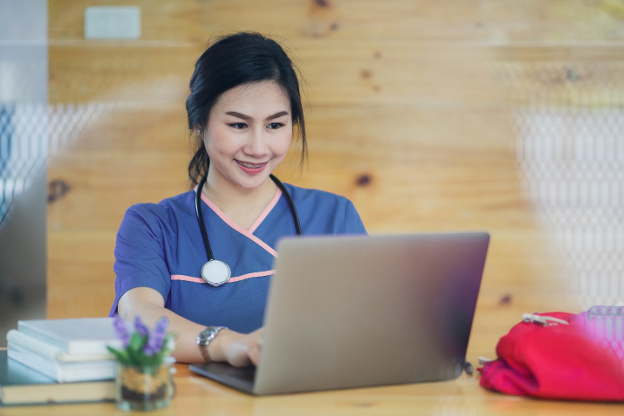 Nurse training on laptop