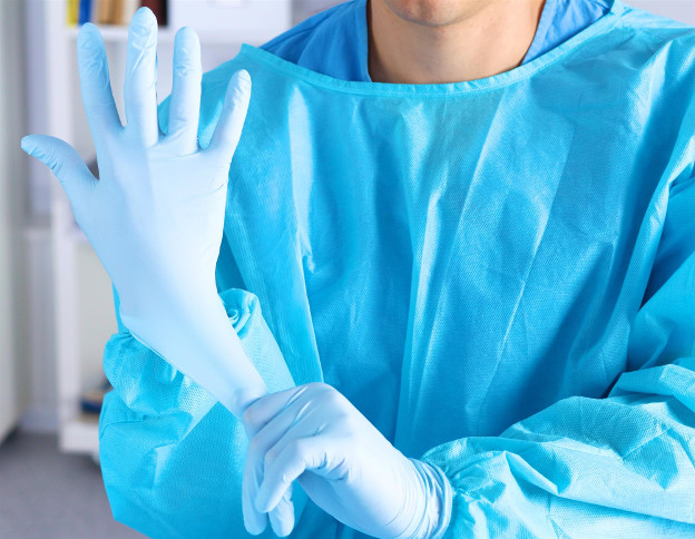 Medical worker wearing gloves